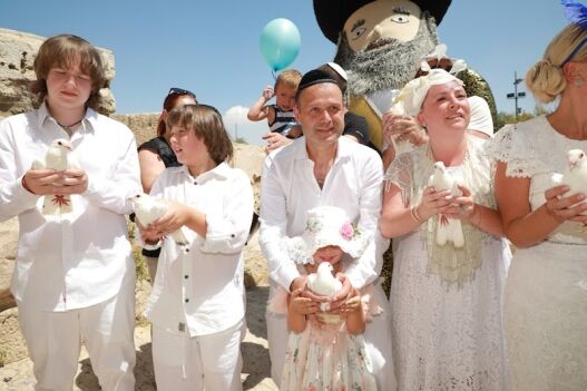 תמונה הפרחת יונים לבר מצווה בכותל
