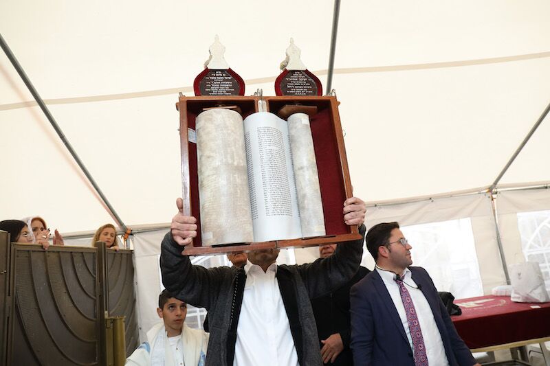 בר מצווה בכותל בגשם